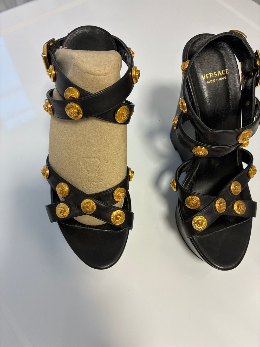 Versace Black Leather Strappy Sandals with Gold Medusa Buttons in size 36.5 EU